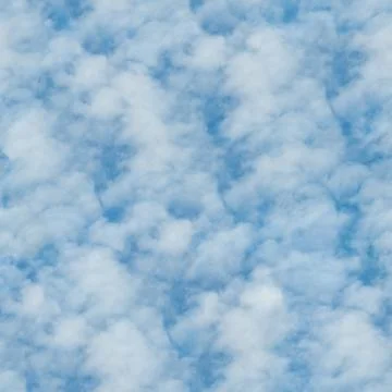 Seamless texture of clouds on a blue sky background Foto stock