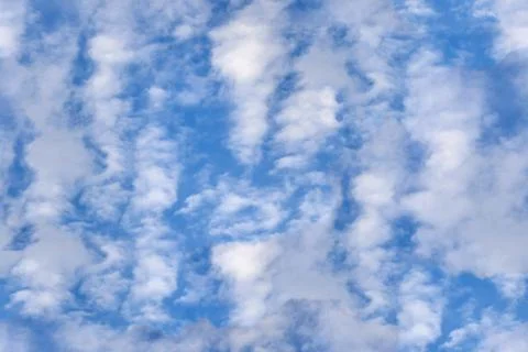 Seamless texture of clouds on a blue sky background Stock Photos