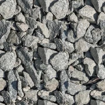 Seamless texture of crushed stone. Stock Photos