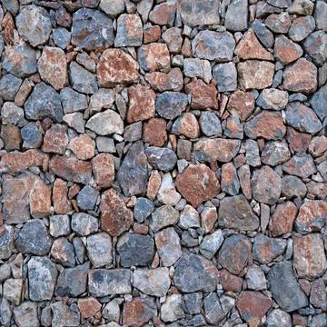 Seamless texture of masonry stone wall of natural multicolored stone of various Stock Photos
