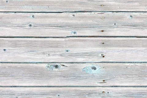 Seamless texture of an old plank wall made of old peeling boards 库存照片