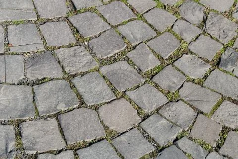 Seamless texture of old square stone pavement. Stock Photos