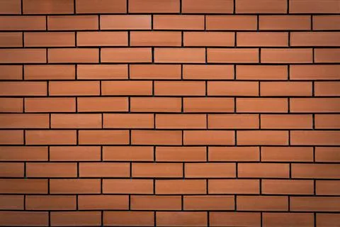 Seamless texture of orange brick wall, blackground, backdrop, wallpaper. 스톡 사진