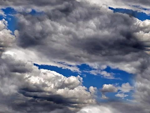 Seamless texture, pattern - dark storm clouds in the blue sky. Background for Foto stock
