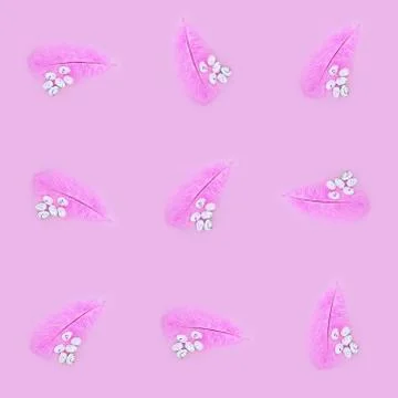 Seamless texture of pink feather and eggs on a pink background. Easter concep Stock Illustration