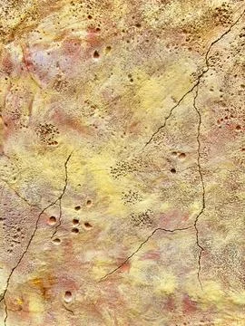 Seamless texture of plaster on the wall. The pattern is yellow with differe.. Stock Photos