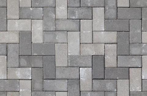 Seamless texture of street tiles. Pattern of gray sidewalk tiles Stock Photos