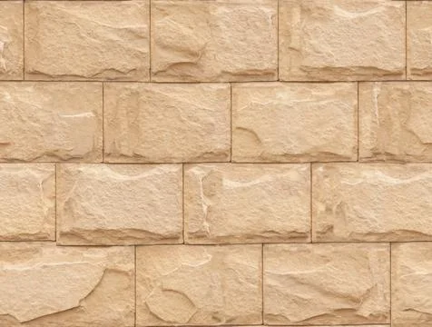 Seamless texture of the wall covered with decorative stone 库存照片