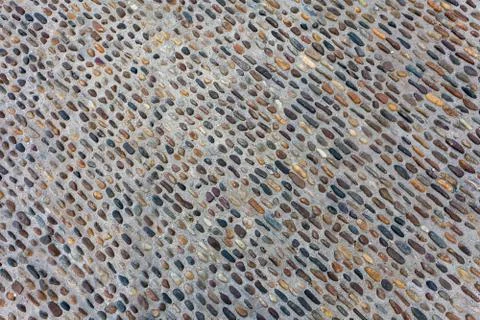 Seamless tile background made of small stones Stock Photos