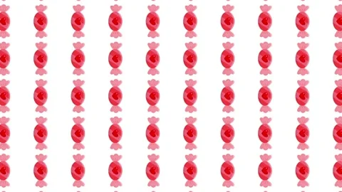 Seamless Valentine's Day Pattern with Pink Heart Wrapped Candies on White Stock Footage 345539844