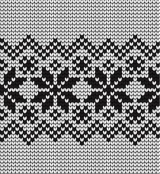 Seamless vector geometric pattern knitted black and white Stock Illustration