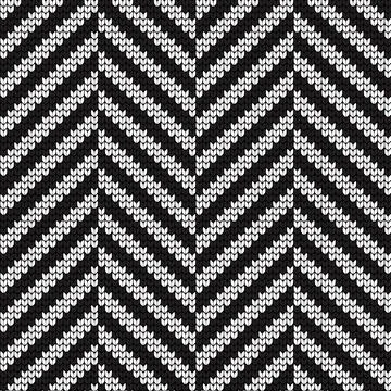 Seamless vector geometric pattern knitted black and white Stock Illustration