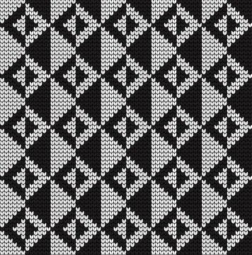 Seamless vector geometric pattern knitted black and white Stock Illustration