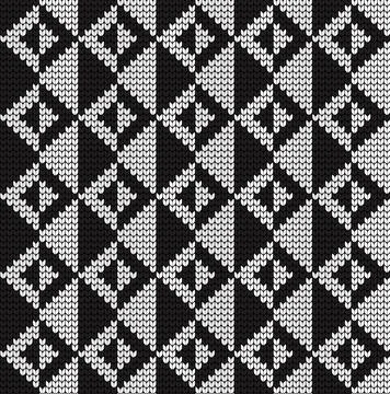 Seamless vector geometric pattern knitted black and white Stock Illustration