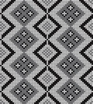 Seamless vector geometric pattern knitted black and white Stock Illustration