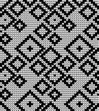 Seamless vector geometric pattern knitted black and white Stock Illustration