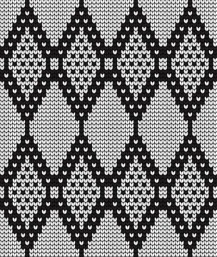 Seamless vector geometric pattern knitted black and white Stock Illustration
