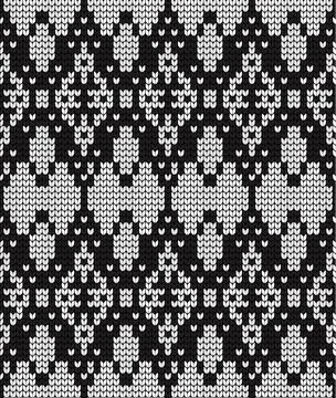 Seamless vector geometric pattern knitted black and white Stock Illustration