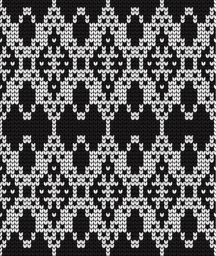 Seamless vector geometric pattern knitted black and white Stock Illustration