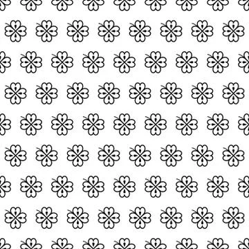 Seamless vector pattern with black clover leaves, shamrock on a white backdrop イラスト素材