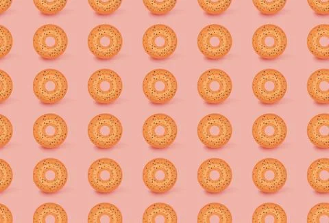 Seamless vector pattern of donuts on light orange background. Cute vector Stock Illustration