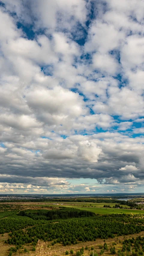 Seamless Vertical Cloudscape Loop from Elevated View 4K Time-Lapse Sky Stock Footage 311080196
