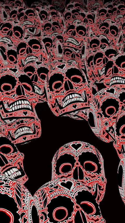 Seamless vertical video animation of a pattern of tattooed skull in printed Video stock 317529339