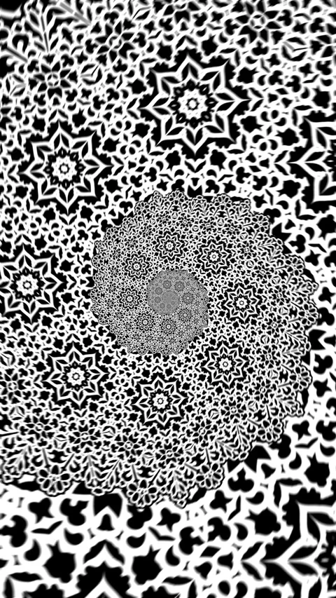 Seamless vertical video of a black and white mandala pattern swirl. Geometric Stock-Footage 339086677