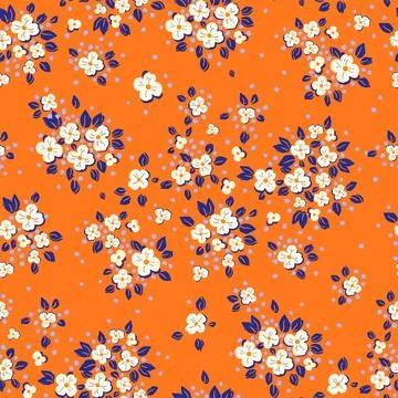 Seamless vintage pattern. Small white flowers on an orange background. Vect.. Stock Illustration