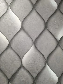 Seamless wall panel texture with grey undulating scale pattern and grainy s.. Stock Photos