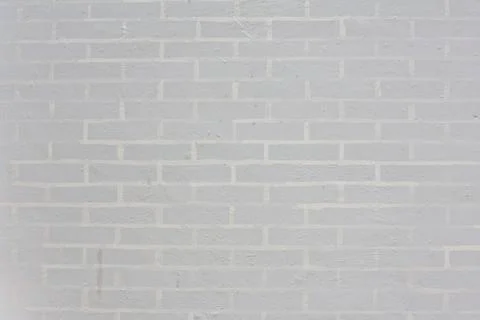 Seamless white brick wall - background pattern for continuous replicate. Stock Photos