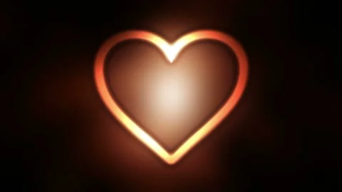 Seamlessly looped motion background shows a romantic glowing heart symbol Stock Footage 160611806