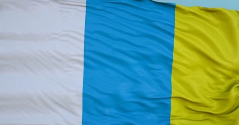 Seamlessly Looping flag for Canary Islands, blowing beautifully in the wind. Stock Footage 80976506