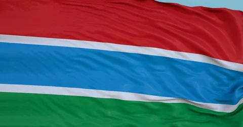 Seamlessly Looping flag for Gambia, blowing beautifully in the wind. Slo-Motion. Video stock 80976034