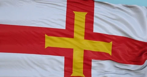 Seamlessly Looping flag for Guernsey, blowing beautifully in the wind. Vídeo Stock 80977300