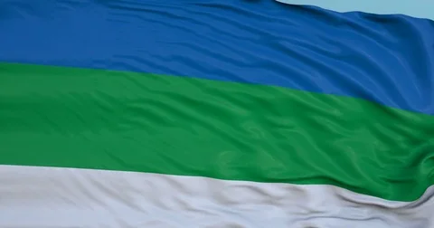 Seamlessly Looping flag for Komi, blowing beautifully in the wind. Slo-Motion. Stock Footage 80975351