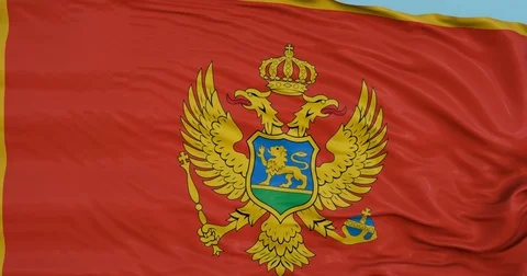 Seamlessly Looping flag for Montenegro, blowing beautifully in the wind. Video stock 80976721