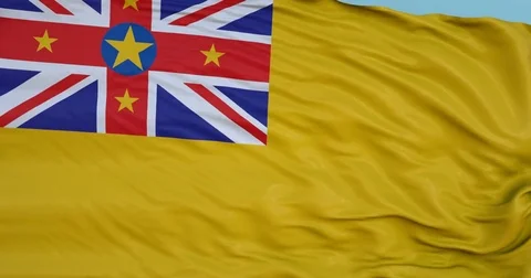 Seamlessly Looping flag for Niue, blowing beautifully in the wind. Slo-Motion. Stock-Footage 80975702