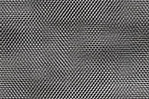 Seamlessly tileable rendered texture with a metallic pattern Stock Photos