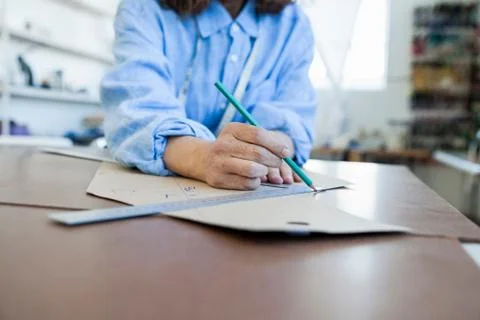 Seamstress drafting sewing pattern Stock Photos