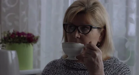 The seamstress drinks coffee Stock Footage 146201900