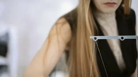 Seamstress to fill in the thread serger for processing tissue edges Stock Footage 73287936