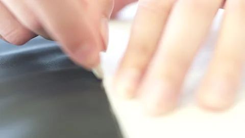 Seamstress Hands Making Marks On The Dark Textile Using The Soap Stock Footage 267015156