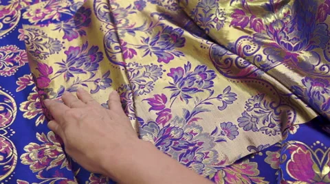 Seamstress Inspecting Fabric Stock Footage 44448337