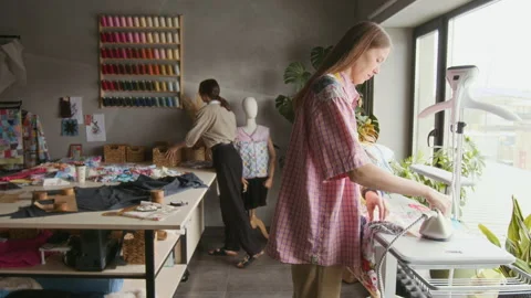 Seamstress Ironing Unfinished Patchwork Piece in Workshop 스톡 동영상 315735640