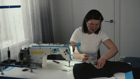 Seamstress marking textile before sewing Stock Footage 335142271