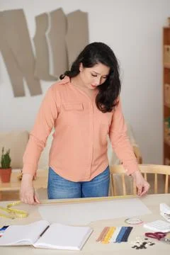 Seamstress Measuring Sewing Pattern Stock Photos