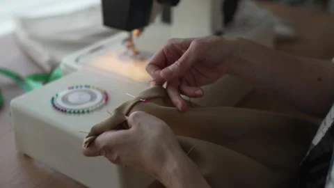 Seamstress preparing fabric for sewing machine Stock Footage 326005720