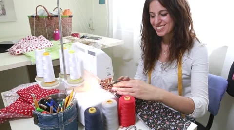 Seamstress sewing in her studio Stock Footage 62445245