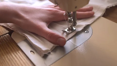 Seamstress sewing on the sewing machine. Stock Footage 86628215